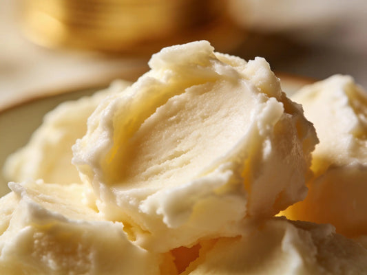 Applying raw Shea Butter to skin before bedtime.